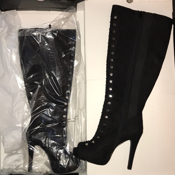 Torrid Shoes - Peep toe black suede lace up boots Never worn.